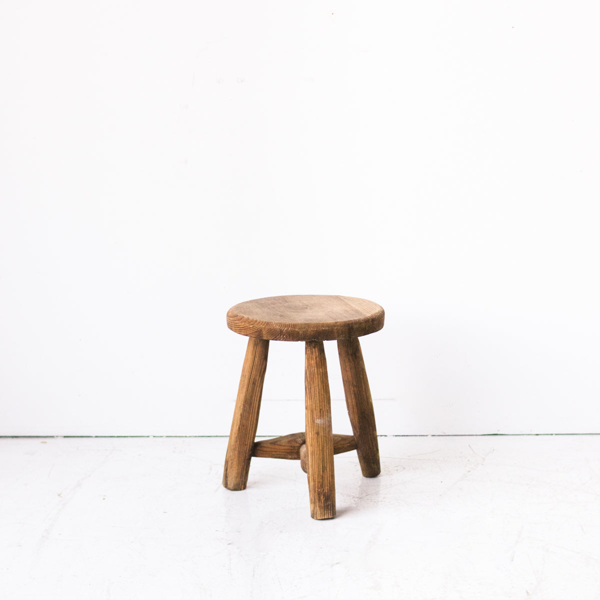 Wooden stool on a white background