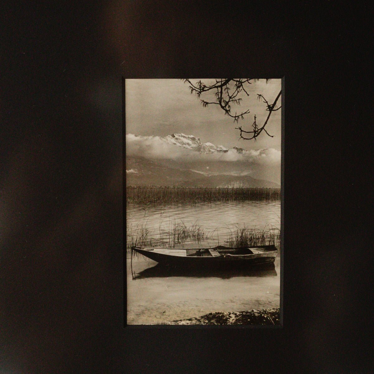 Canoe in Mountain Pond Photograph - elsie green - art