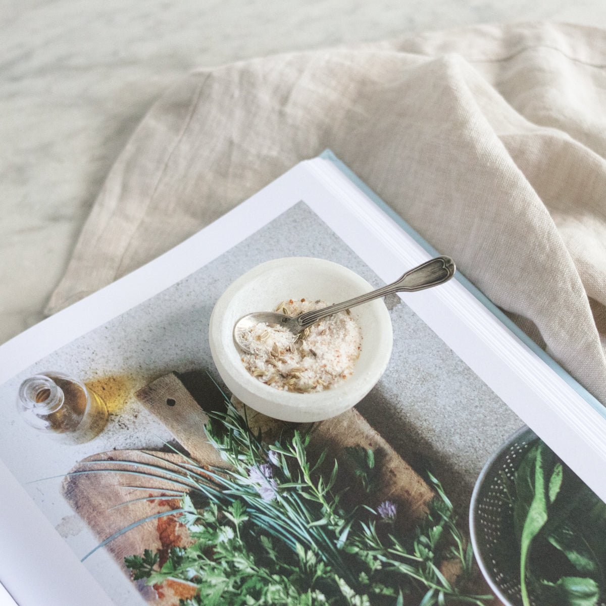French at Heart Cookbook with Moroccan Marble Bowl and Silver Salt Spoon - elsie green - the french kitchen