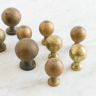 Set Of 9 Brass Knobs - elsie green - decor
