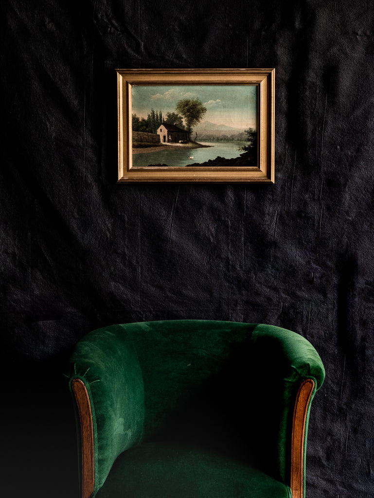 velvet chair with oil painting