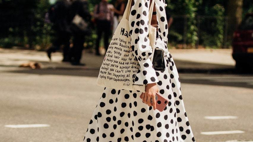 woman in polka dot dress