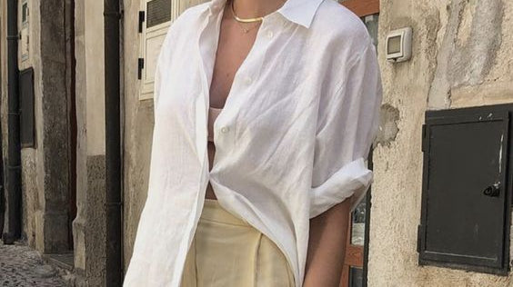 woman in white linen blouse