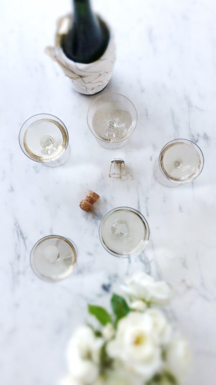 The History of Champagne Glasses - elsie green