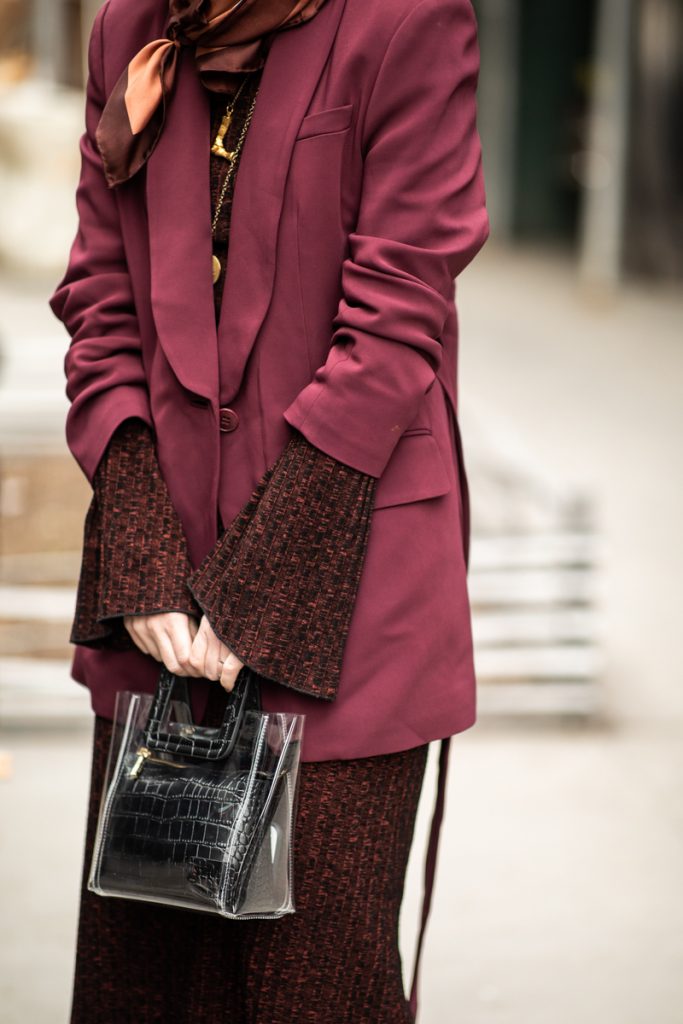 woman in burgundy suit