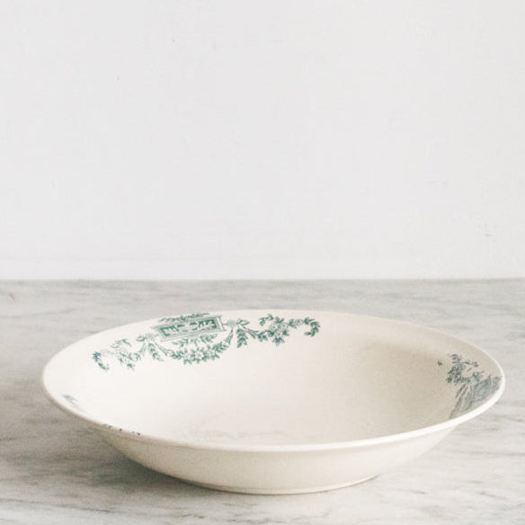 Ceramic bowl with floral pattern on a marble surface