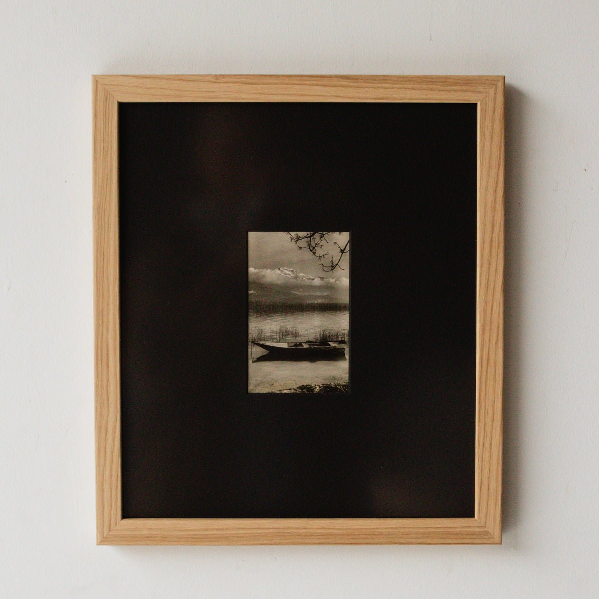 Canoe in Mountain Pond Photograph - elsie green - art