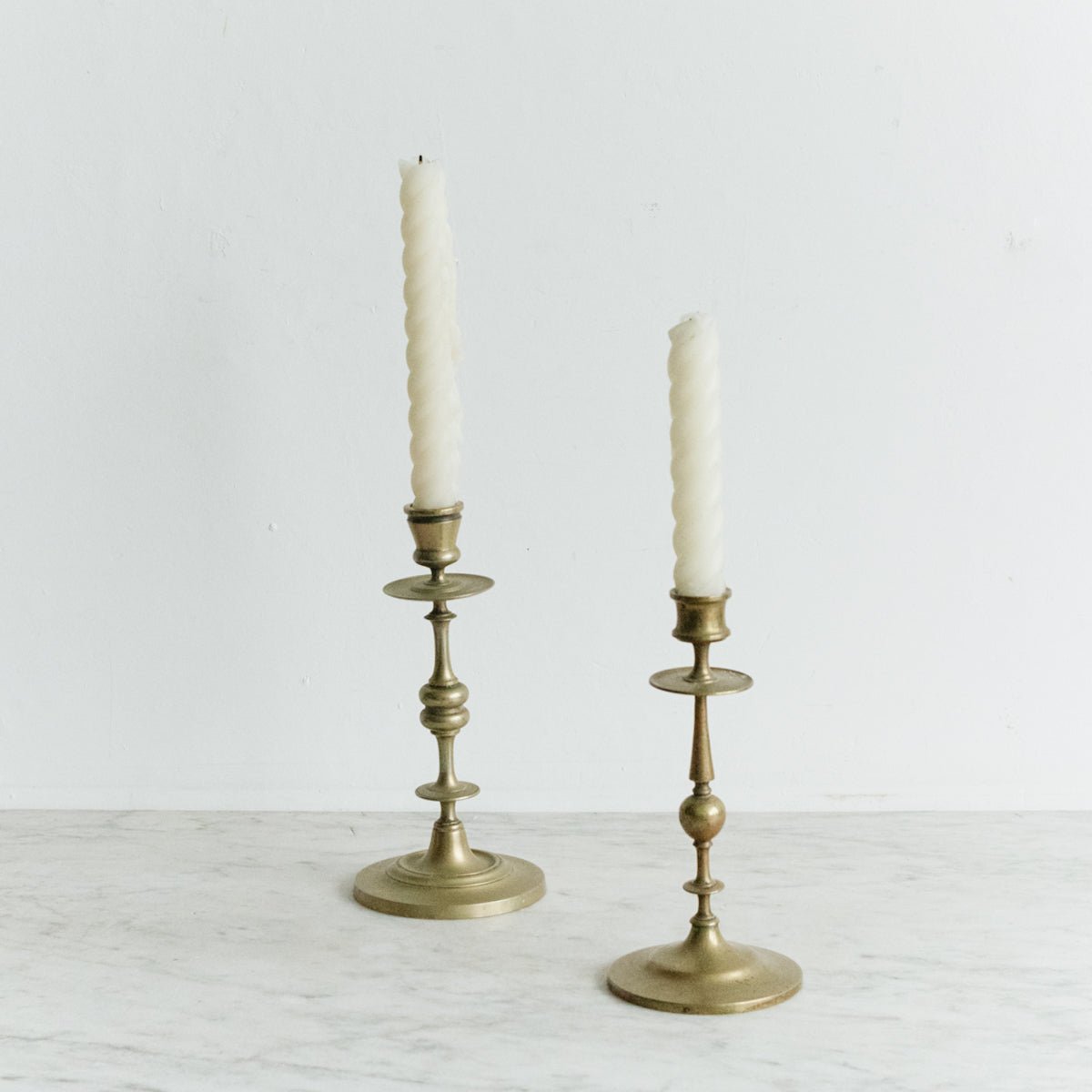Eclectic Pair of Brass Candlesticks - elsie green - decor