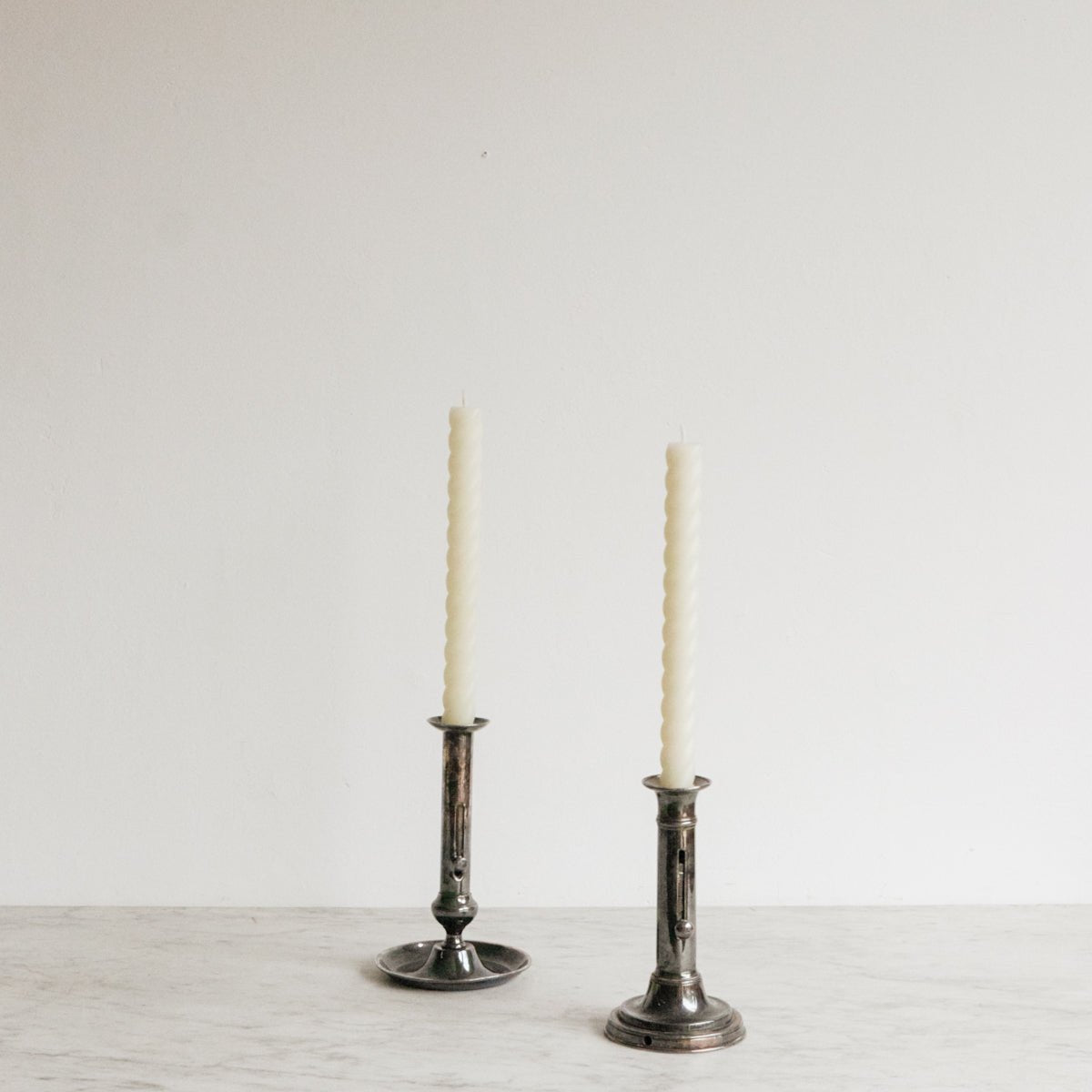 Eclectic Pair of Silver Candlesticks - elsie green - decor