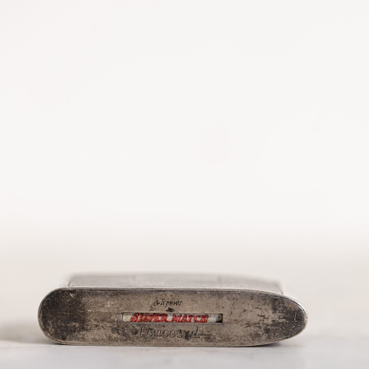 Vintage Silver Match Compound Pocket Lighter | The Patrick Orbe Collection - elsie green - decor