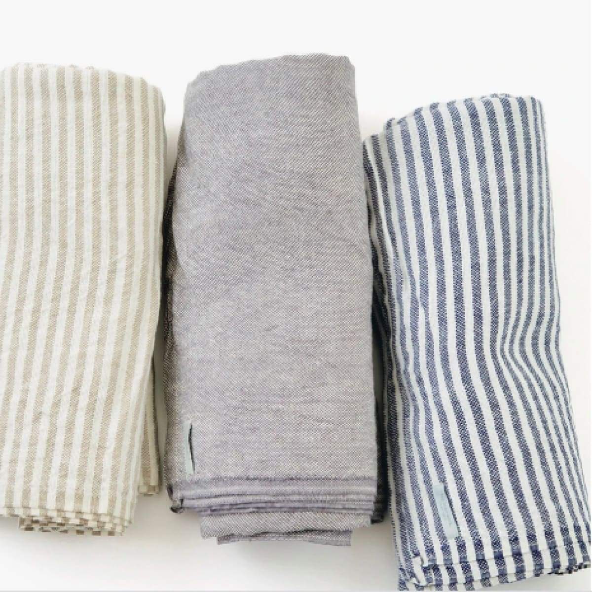 https://elsiegreen.com/cdn/shop/products/chambray-linen-throw-textiles-blanket-blankets-core-cotton-towel-kitchen-linens-925.jpg?v=1610740597