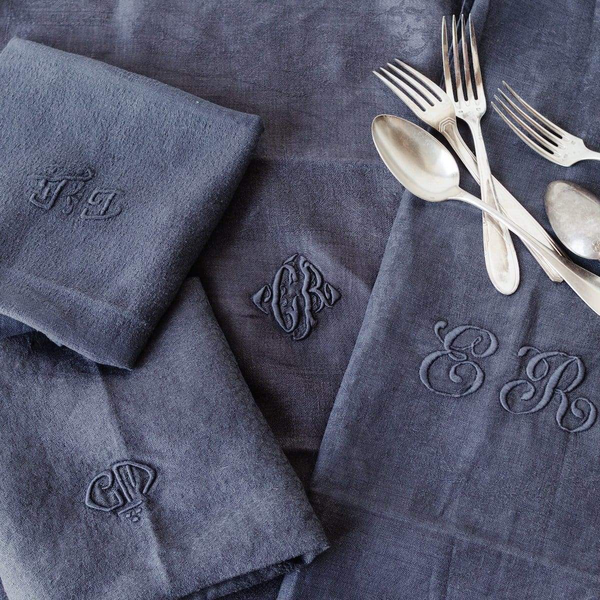 https://elsiegreen.com/cdn/shop/products/vintage-over-dyed-napkin-set-of-4-textiles-core-french-linen-monogram-napkins-sleeve-grey-beige-376.jpg?v=1631289593
